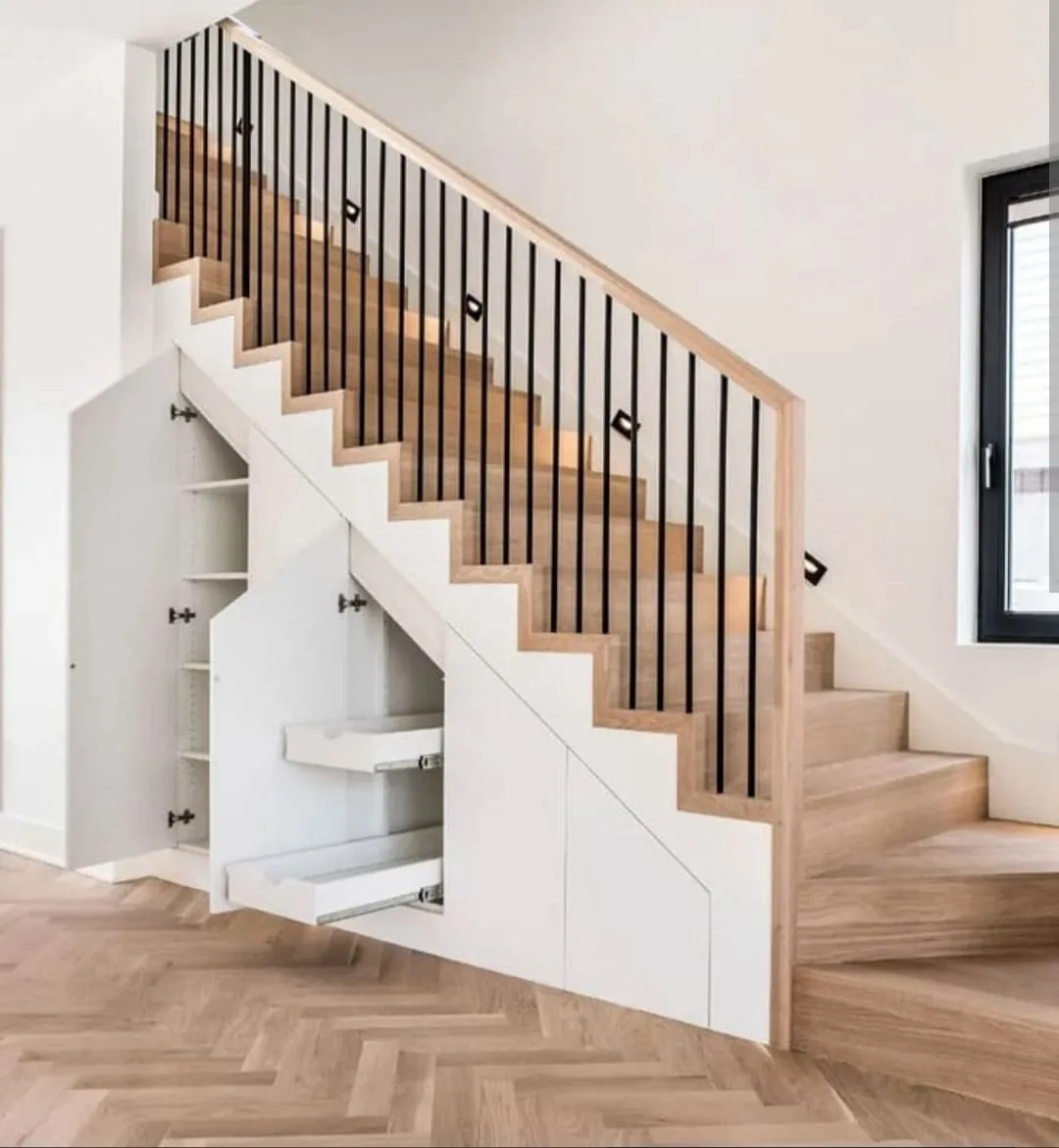 Escalier quart tournant barreaux metal forge